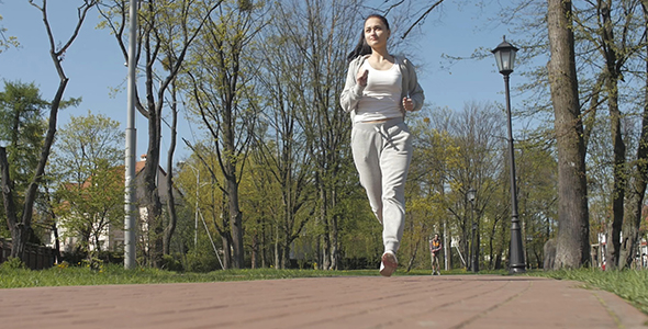 Young Female Athlete Jogging