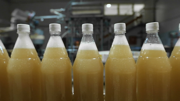 Lemonade In Plastic Bottles On The Conveyor, Stock Footage | VideoHive