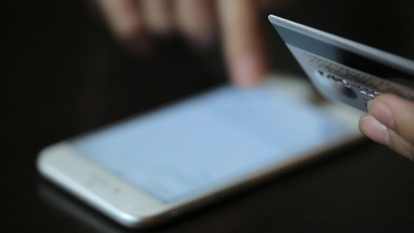 Young Woman Dialing The Number