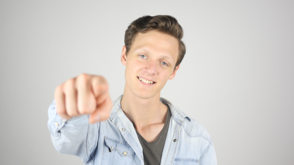 Boy Pointing Finger toward Camera alt