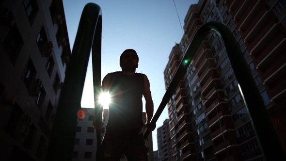 Cross Fit Man Working Out Doing Dips Or Push-ups Exercises Strength Training