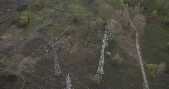 Flying Over a Power Line in the Countryside