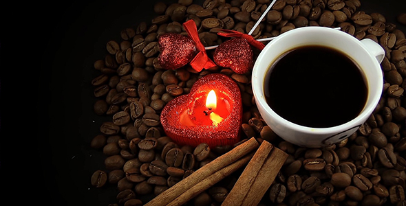 Cup of Coffee & Heart Candle on Coffee Beans