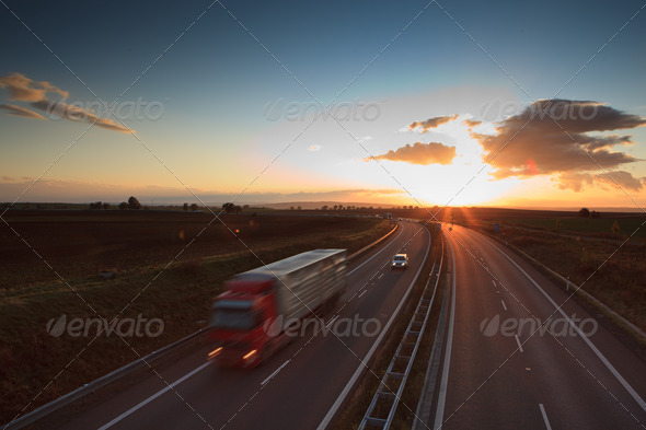 highway traffic - motion blurred truck on a highway/motorway/spe - Stock Photo - Images