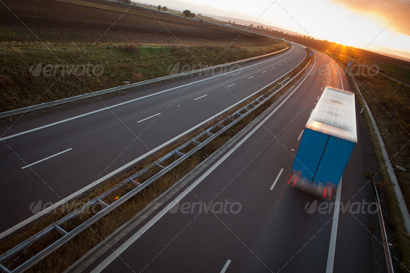 highway traffic - motion blurred truck on a highway/motorway/spe - Stock Photo - Images