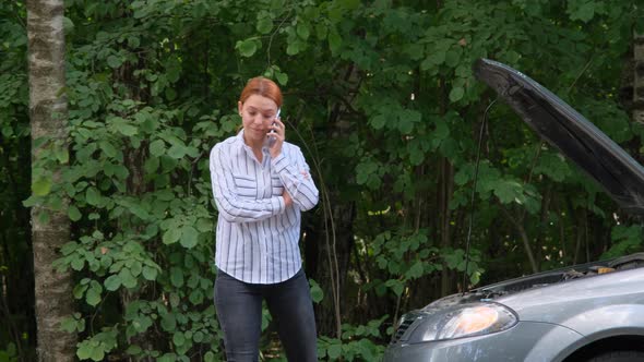 Distempered Attractive Businesswoman Countryside Road Trying To Get Help Her Broken Down Car alt