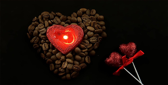 Heart Shaped Candle in Coffee Beans and Glittering Red Hearts