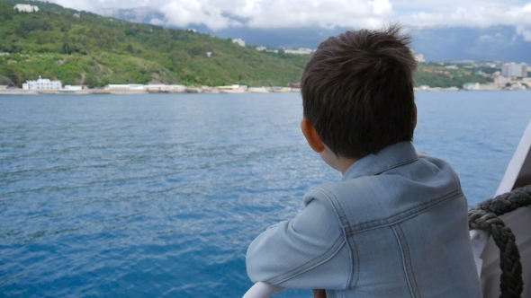 The Boy On The Ship In Windy Weather