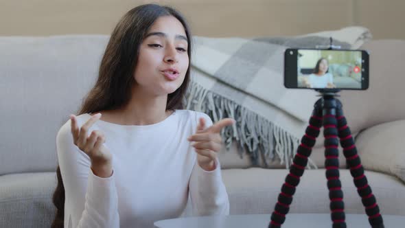 Female Influencer Blogger Attractive Young Girl Woman Sits at Home in Front Mobile Phone Camera on alt