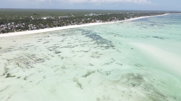 Aerial View of Low Tide in the Ocean Near the Coast of Zanzibar Tanzania Slow Motion alt