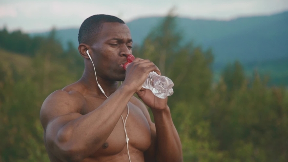 Exhausted African American Muscular Man