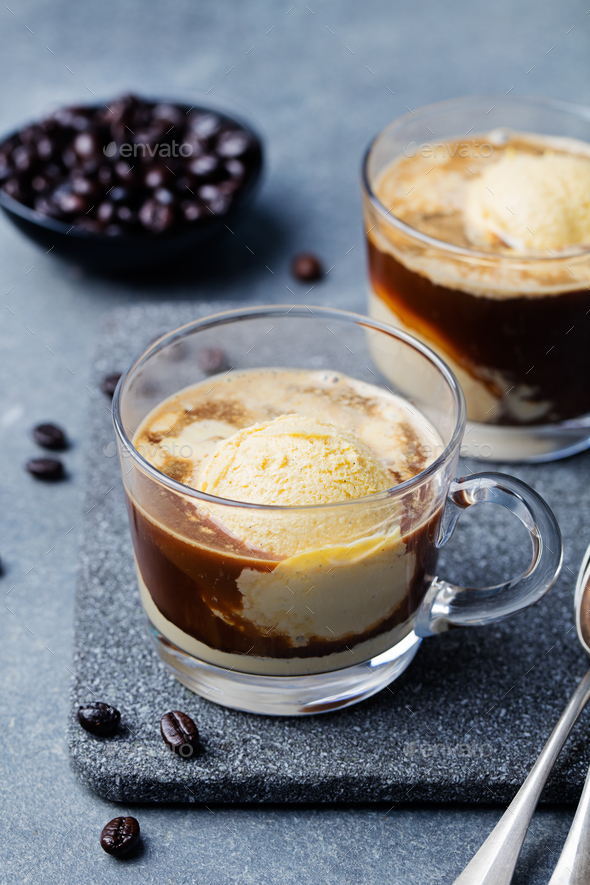 Affogato coffee with ice cream on a glass cup Grey slate background Food  Images