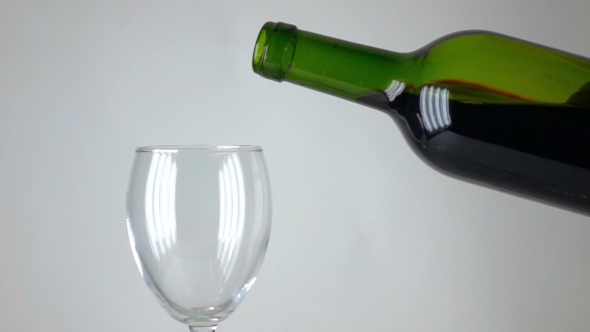 Pouring Red Wine Into a Glass alt