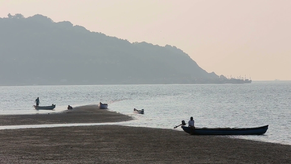 Misty Tropical Seascape With Boats And Fishermen Silhouettes alt