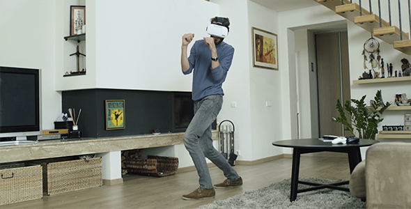 Man Playing Boxing Game In Virtual Reality