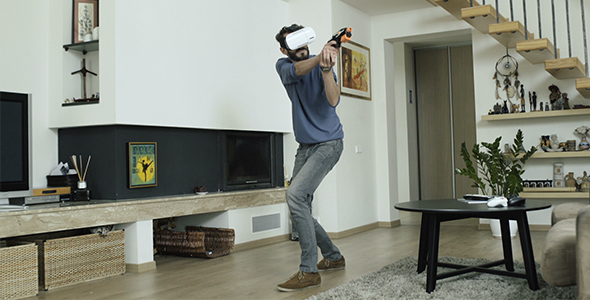 Man Playing Action Game In Virtual Reality