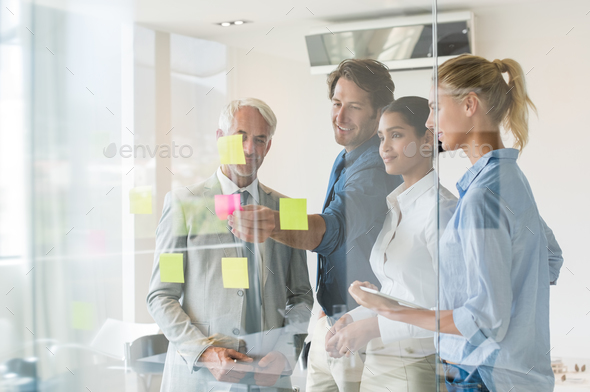 Happy business team working - Stock Photo - Images