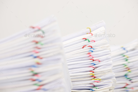 Pile document have blur overload paperwork as foreground and background