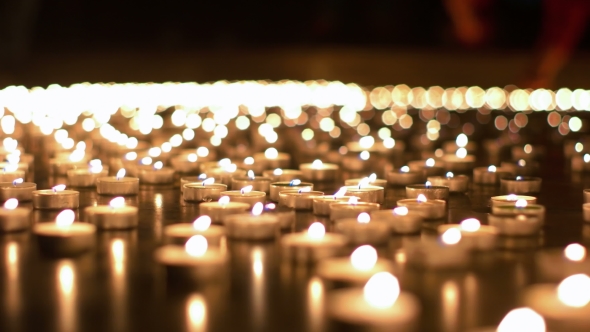 Hundreds Of Candles Burning During Church Event
