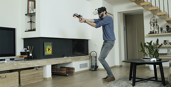 Man Playing Action Game In VR World