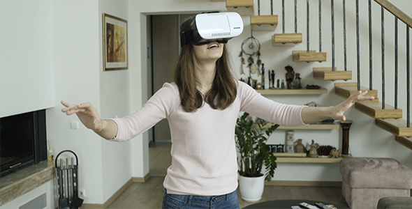 Girl Explores Virtual Reality Device Interface
