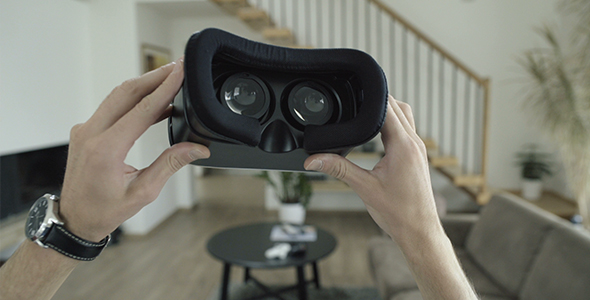 Putting On Virtual Reality Headset