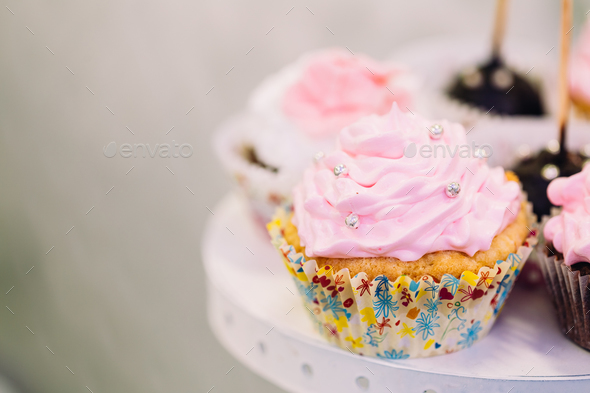 Dessert Sweet Tasty Cupcake In Candy Bar On Table. Delicious Swe - Stock Photo - Images