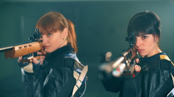Women Shooting With Rifle alt