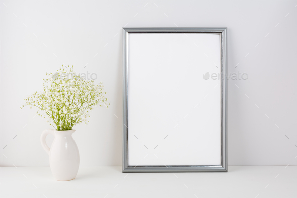 Placeit-Frame mockup with white tender flowers - Stock Photo - Images