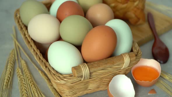 Close Up of Fresh Raw Eggs in Wicker Basket