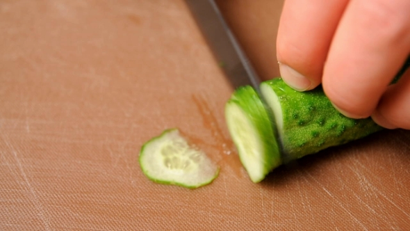 Slicing Green Cucumber