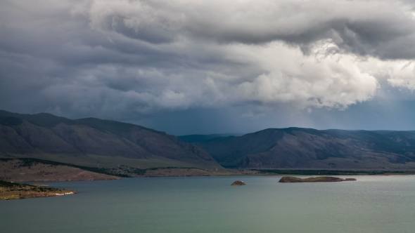 Stormy Clouds Above a Big Lake