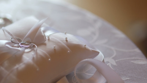 Wedding Rings On a Pillow alt
