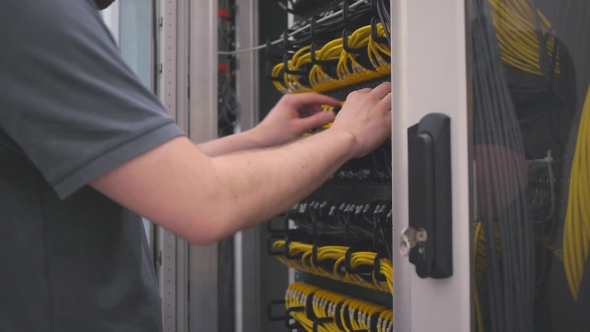 IT Engineer Open The Server Rack alt