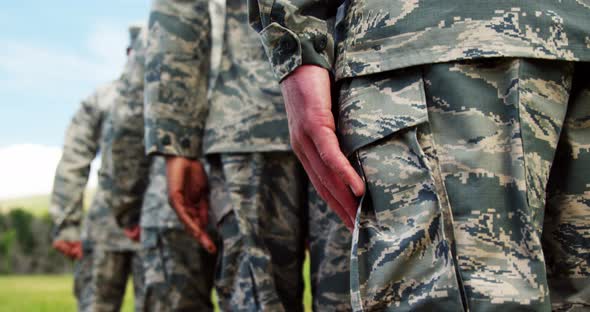 Group of military soldiers standing in line 4k alt
