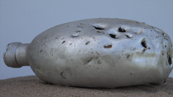 Shells and Bullets Holes in the Watter Canteen alt