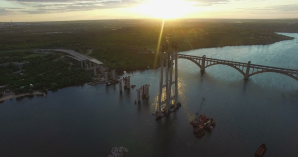 Aerial View On Building New Bridge Over River alt