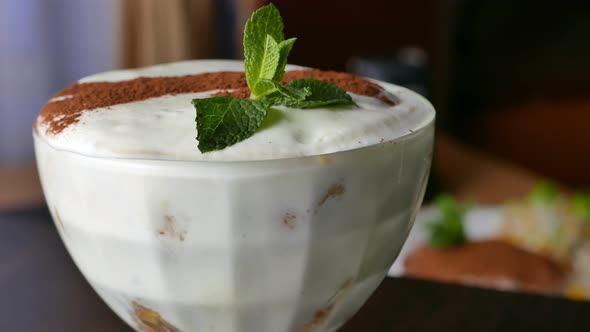 Tiramisu Dessert with Mint in a Glass Bowl