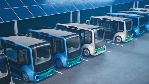 Electric cars charging station. Minibuses stopped to charge the batteries. alt