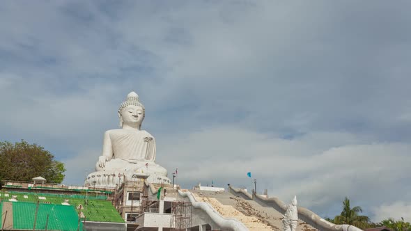 Time Lapse White Cloud In Blue Sky Behind Phuket Big Buddha. alt