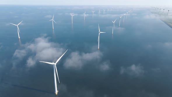 Huge Windmill Turbines Offshore Windmill Farm in the Ocean Westermeerwind Park Windmills Isolated at alt