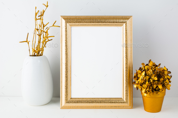 Gold fame mockup with white vase and golden flowerpot - Stock Photo - Images