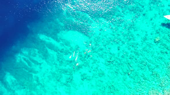 Aerial top view sky of relaxing tourist beach break by clear ocean with white sandy background of a  alt