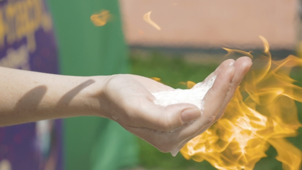 A Hand With Flammable Substance Is Set On Fire