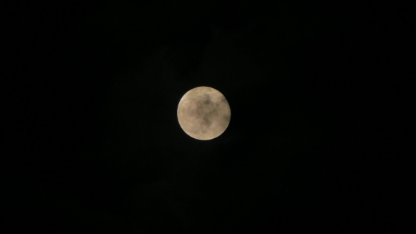 Full Moon Over Dark Black Sky At Night