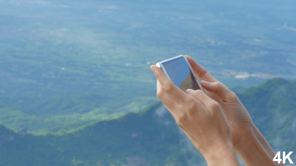 Playing Game On Smartphone alt