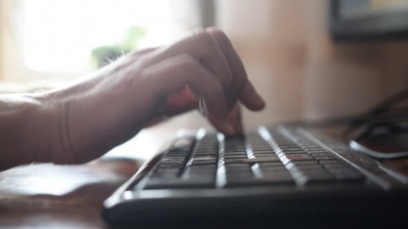  Of Caucasian Male Hands Typing On Keyboard