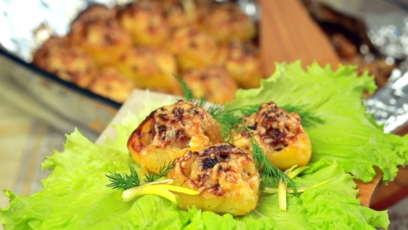 Boats Potato Stuffed With Beef Meat And Hard Parmesan.