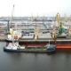 Aerial view of cargo ship in the port with an open hold, awaiting loadin in Saint-Petersburg, Russia - VideoHive Item for Sale