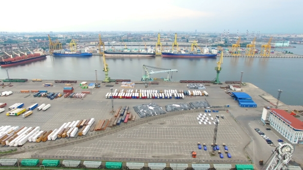 Seaport with cranes, ships, containers and cargo in Saint-Petersburg, Russia alt